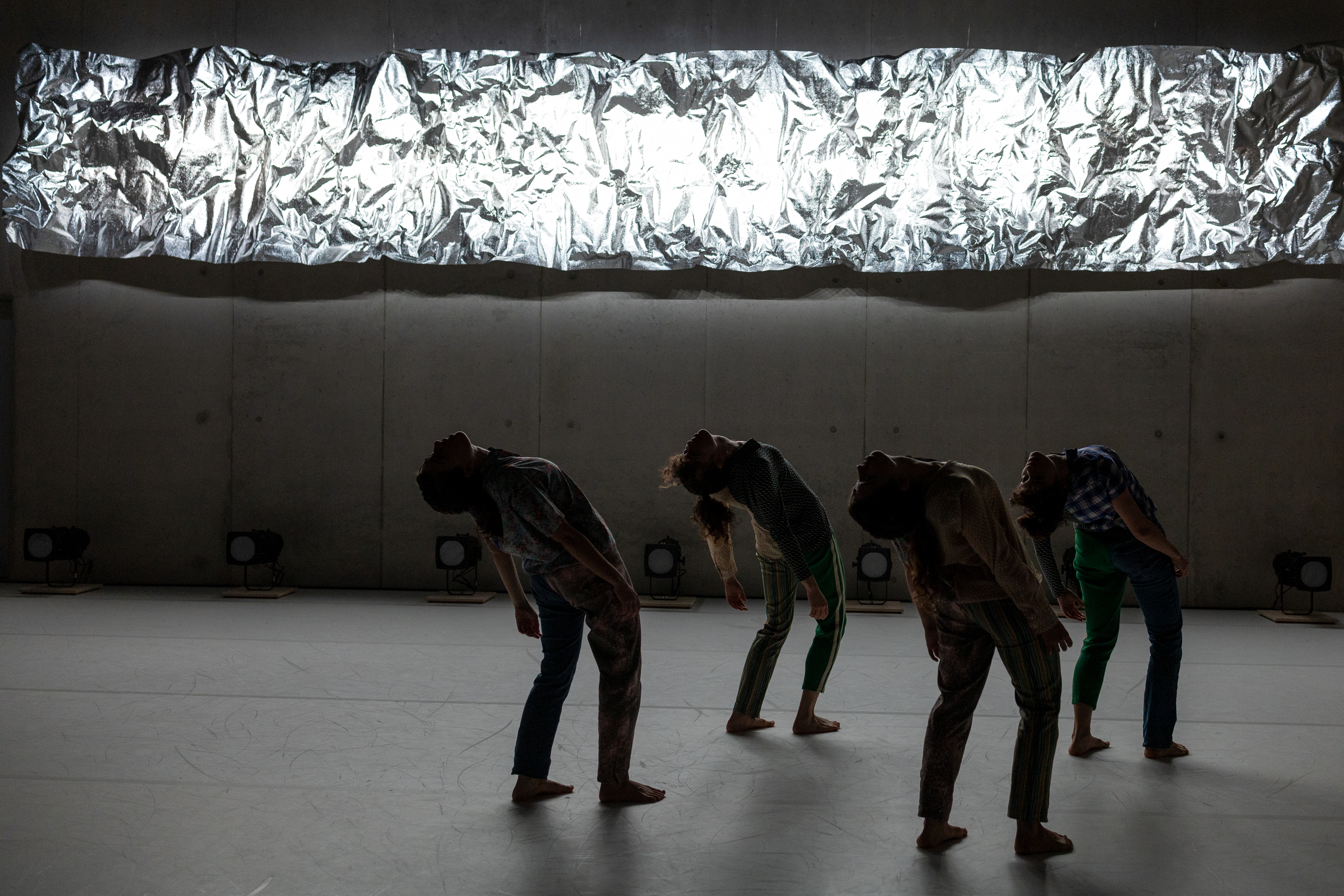 Matilda dancing next to sculpture